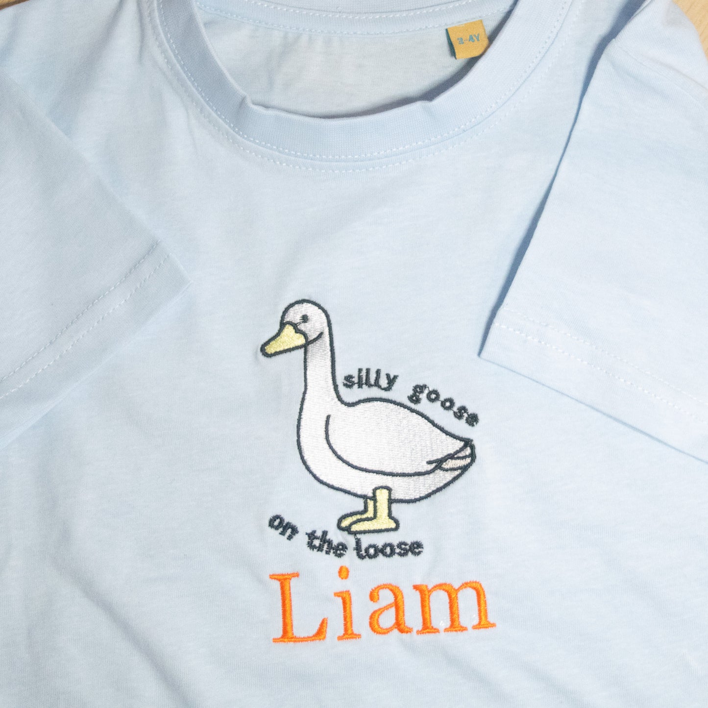 Playful Silly Goose on the loose Infants' T-Shirt - Fun and Comfy Style! 🦢👧👦