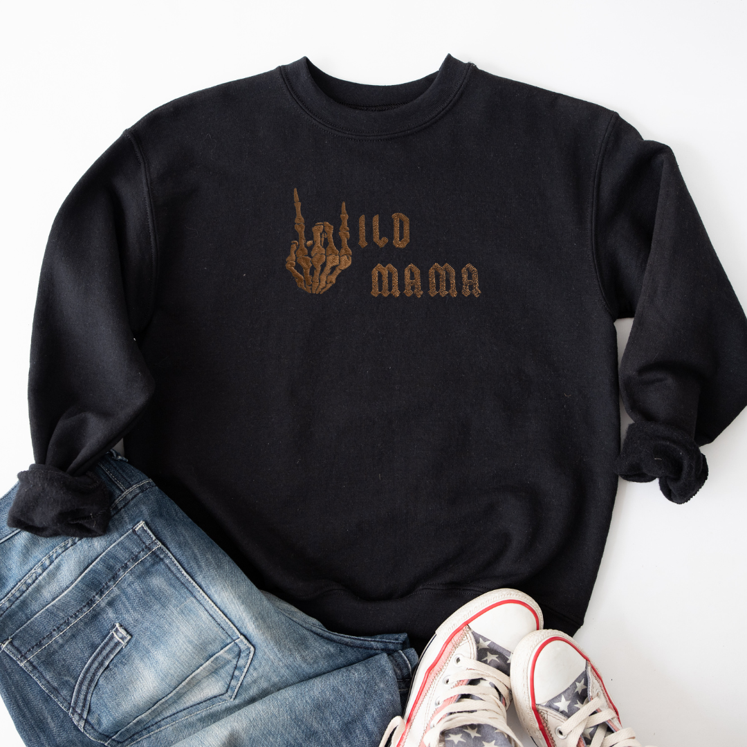 alternative crewneck jumper sweater embroidered with wild mam with a skeleton hand doing rock sign